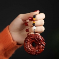 圆龙紫檀手把件